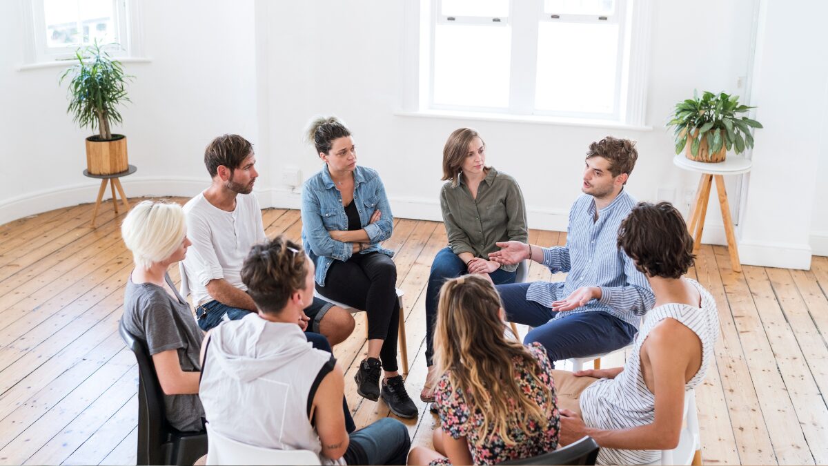 patients sitting in group therapy discussing if they Can I Get Short-Term Disability for Mental Helath?